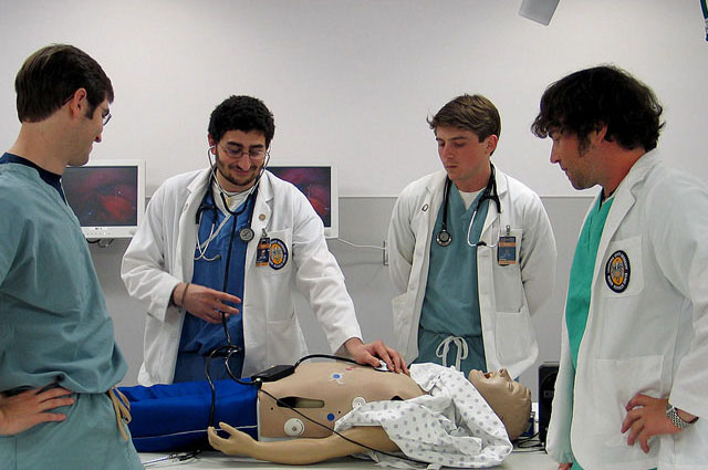 Science and Practice of Medicine 200: Clinical Skills Lab - 2nd Year Medical Students assessing heart sounds