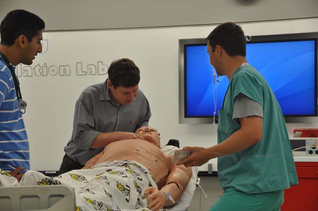 Internal Medicine Resident Skills Fair - Internal Medicine resident engaged in patient simulation