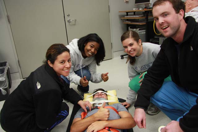 Science and Practice of Medicine 100 - Clinical Skills Lab - 1st Year Medical Students - C-Spine Immobilization and Splinting