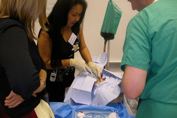 Internal Medicine Residency Skills Fair - Internal Medicine residents performing central line placement