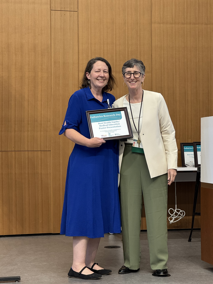 Dr. Creel accepts award.