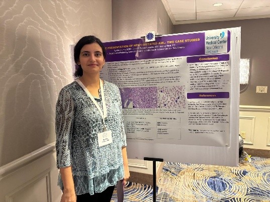 Dr. Younus with her poster