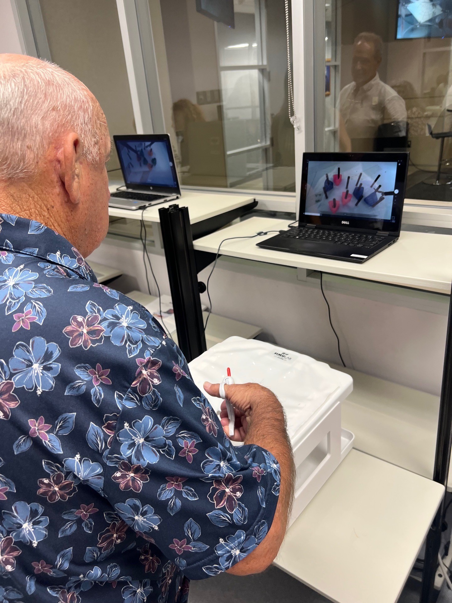 Man tries out equipment at Family Day